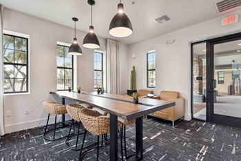 A conference room with a long table and chairs. at The Laurel Apartments, Chandler, 85286